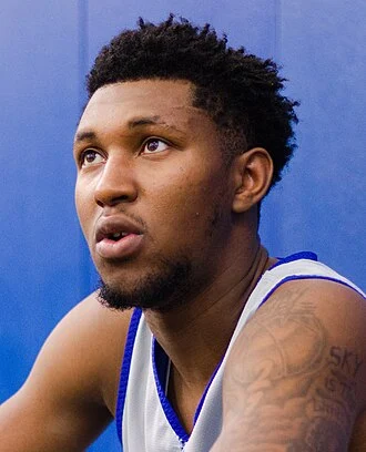 Justin Edwards (basketball, born 2003) height profile photo