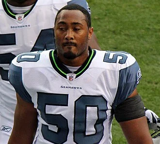 K. J. Wright height profile photo