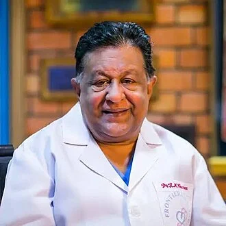K. M. Cherian (doctor) height profile photo