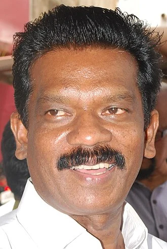 K. Radhakrishnan (politician) height profile photo