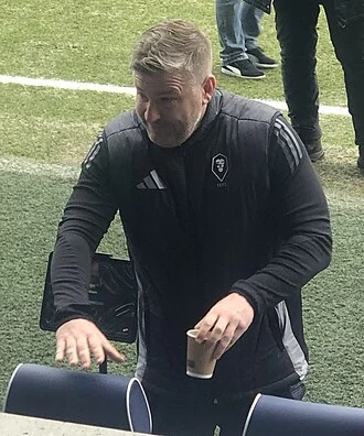 Karl Robinson height profile photo