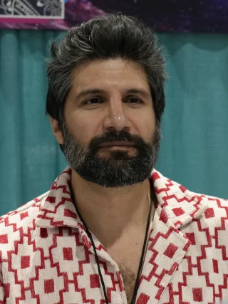 Kayvan Novak height profile photo