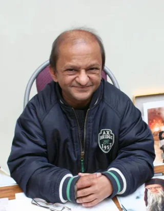 Kiran Shah height profile photo