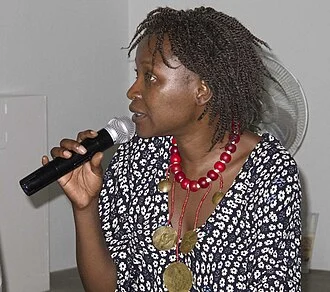 Koyo Kouoh height profile photo