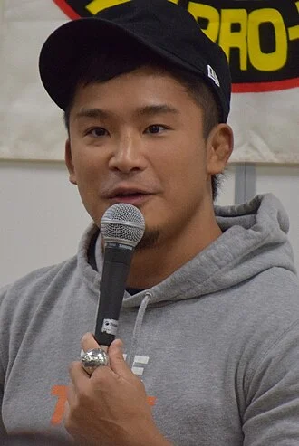 Kushida (wrestler) height profile photo