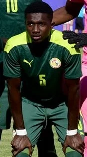 Lamine Camara height profile photo