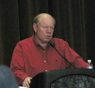 Larry H. Miller height profile photo