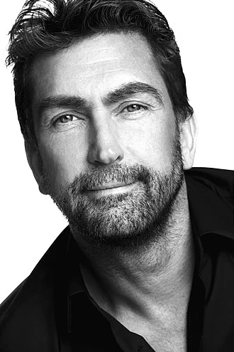 Leslie Benzies height profile photo