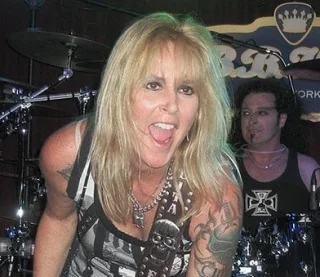 Lita Ford height profile photo