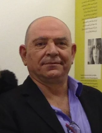 Lokman Slim height profile photo