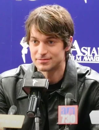 Lucas Bravo height profile photo