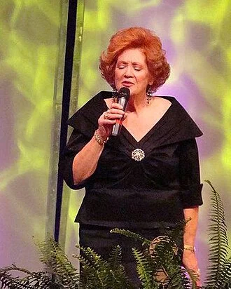 Lulu Roman height profile photo