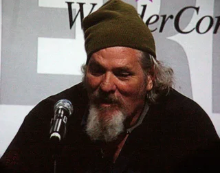 M. C. Gainey height profile photo