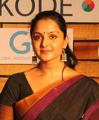 Manju Warrier height profile photo