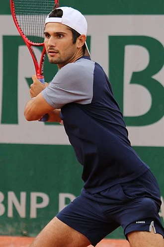 Marcos Giron height profile photo