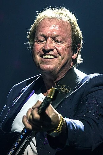 Mark King (musician) height profile photo