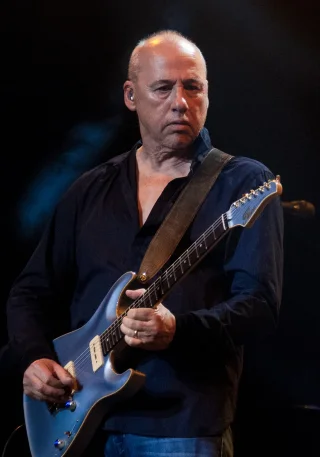 Mark Knopfler height profile photo