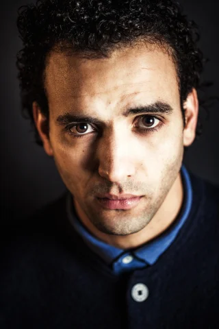 Marwan Kenzari height profile photo