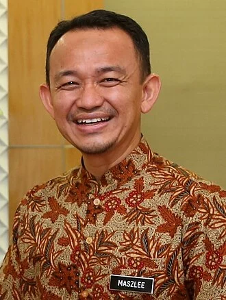 Maszlee Malik height profile photo