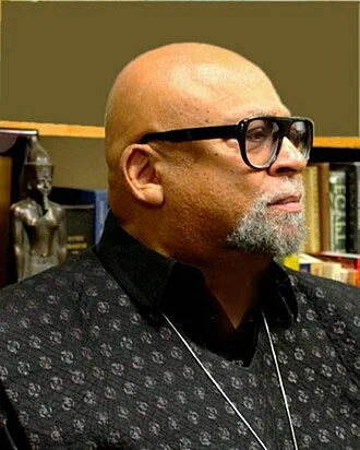 Maulana Karenga height profile photo