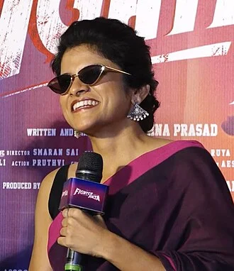 Maya S. Krishnan height profile photo