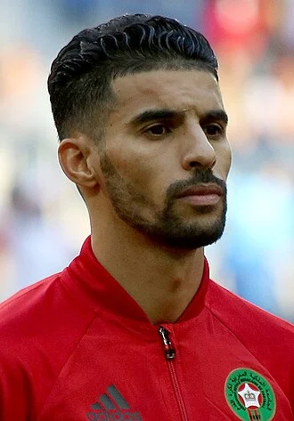 Mbark Boussoufa height profile photo