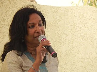 Meena Alexander height profile photo