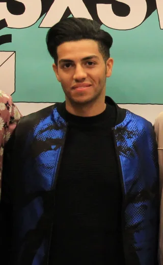 Mena Massoud height profile photo
