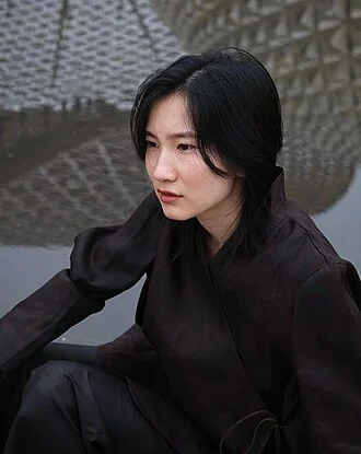 Meng'er Zhang height profile photo