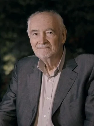 Michael G. Wilson height profile photo
