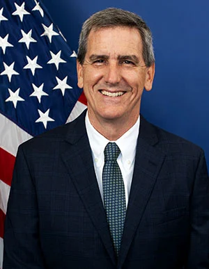 Michael Whitaker (government official) height profile photo