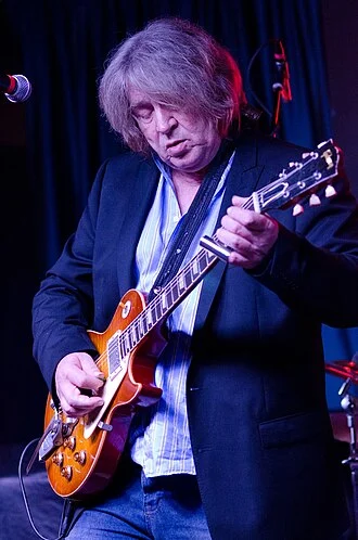 Mick Taylor height profile photo