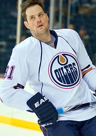 Mike Comrie height profile photo