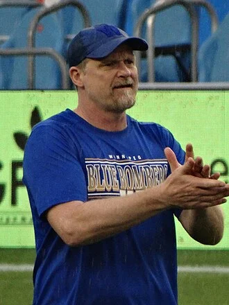 Mike O'Shea (Canadian football) height profile photo