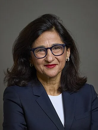 Minouche Shafik height profile photo