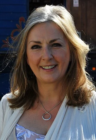 Moya Brennan height profile photo
