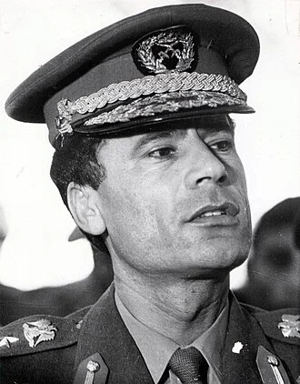 Muammar Gaddafi height profile photo