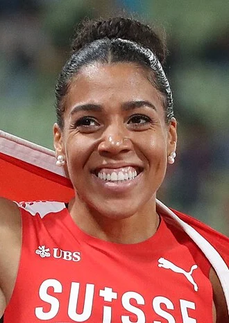 Mujinga Kambundji height profile photo