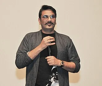 Mukesh Chhabra height profile photo