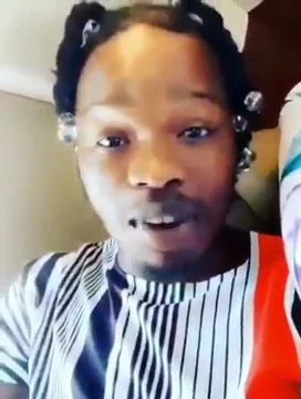 Naira Marley height profile photo