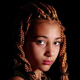 Nandi Bushell height profile photo