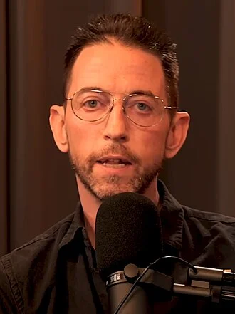 Neal Brennan height profile photo