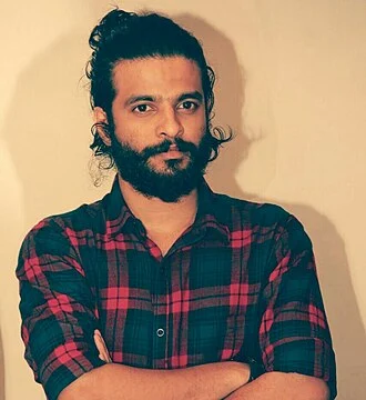 Neeraj Madhav height profile photo