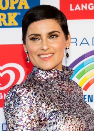 Nelly Furtado height profile photo