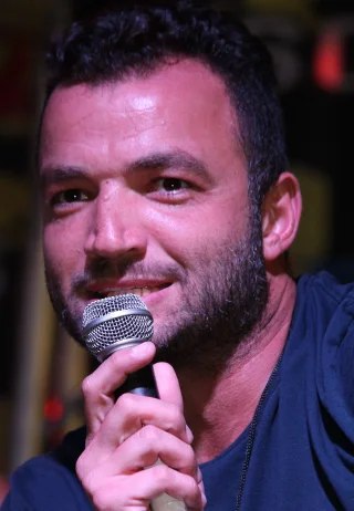 Nick E. Tarabay height profile photo