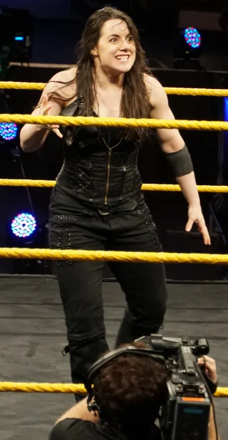 Nikki Cross height profile photo