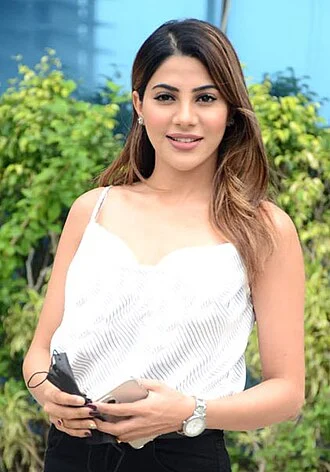 Nikki Tamboli height profile photo