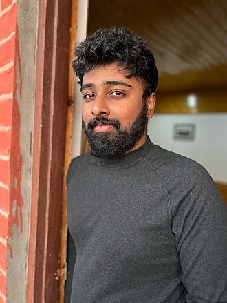 Nimish Ravi height profile photo
