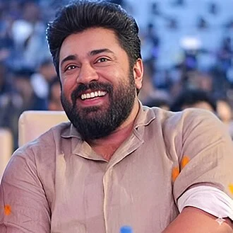 Nivin Pauly height profile photo