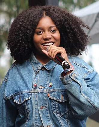 Noname (rapper) height profile photo